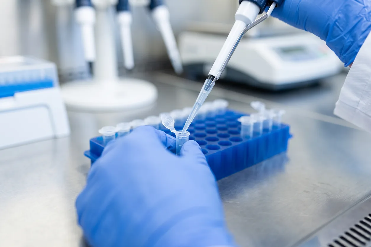 Laboratory technician processing blood samples
